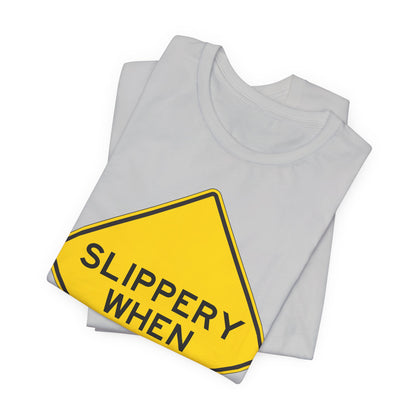 Slippery When Wet Road Sign T-Shirt — Funny Warning Graphic Tee