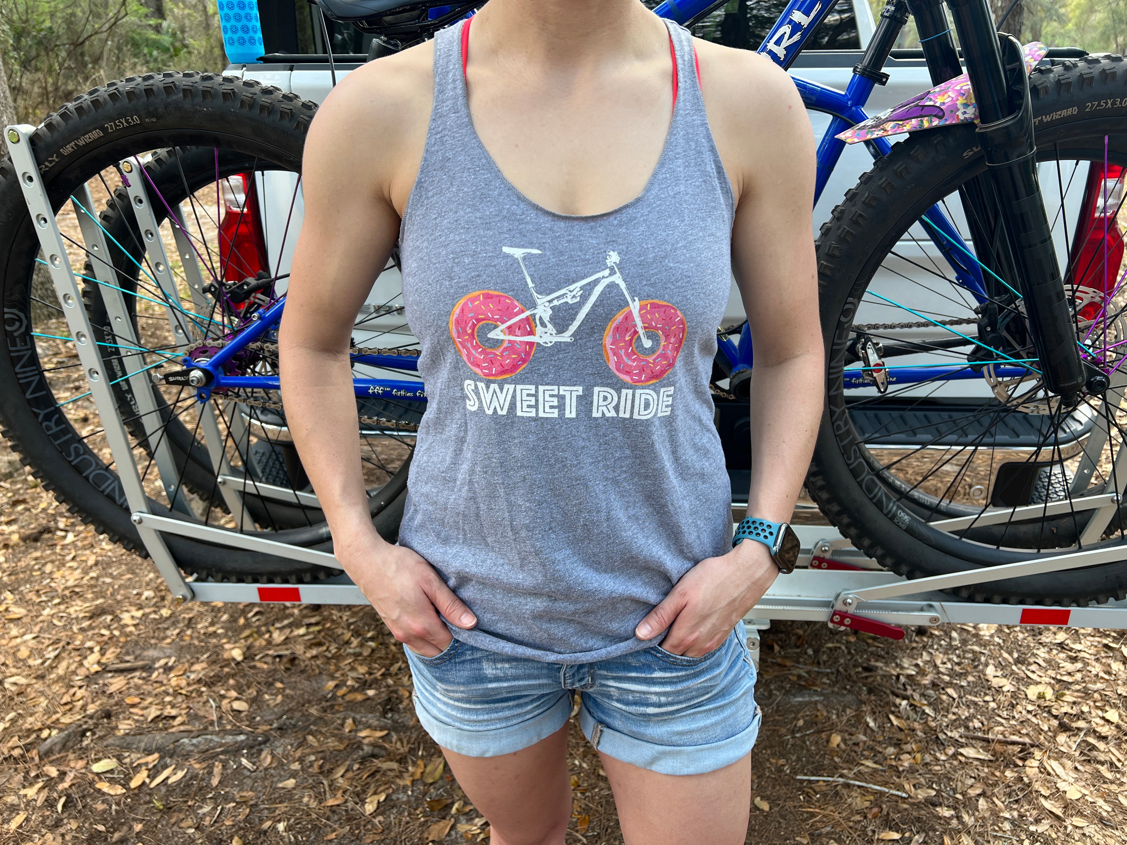 Sweet MTB Ride Tank in front of some sweet bikes